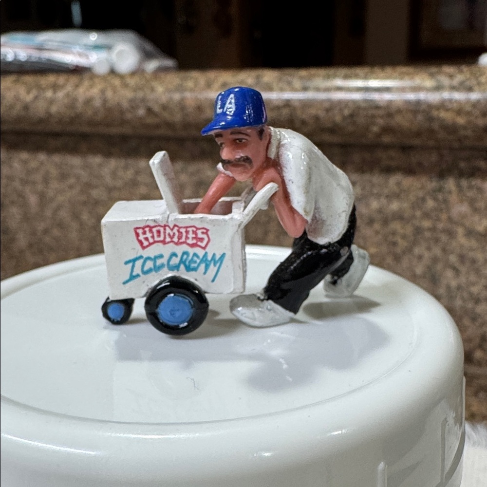 The product is a "Lil Homies" Series 6 miniature figurine of an ice cream vendor